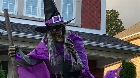 Create a bewitching atmosphere with a 12 ft witch decoration from Home Depot